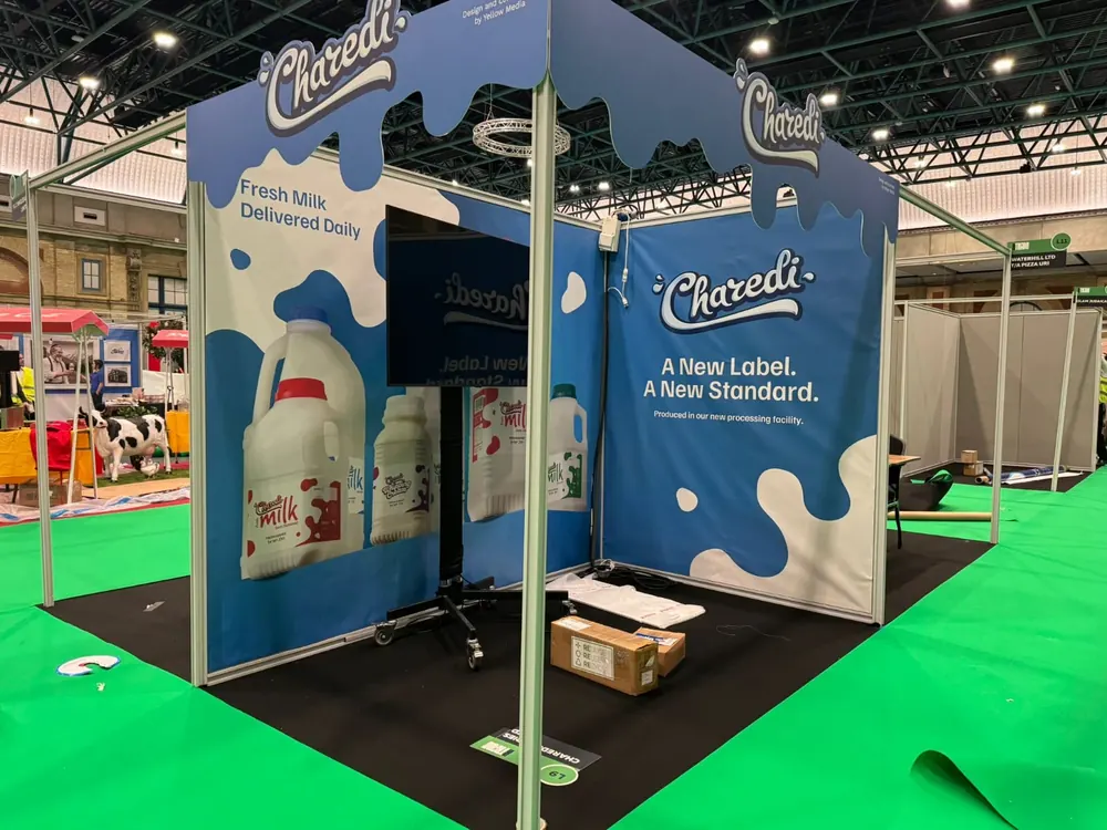 An open stand with milk-splash graphics