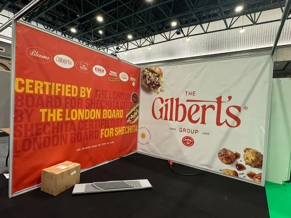 A red shell-scheme stand with food graphics